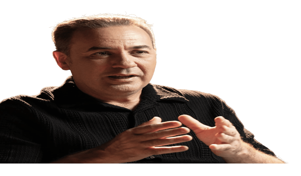 A 426 strategist mid-sentence, gesturing with both hands